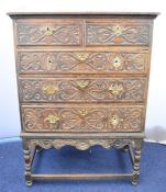 18th /19thC carved oak chest on stand of two over three graduated drawers, W95 x D52 x H135cm