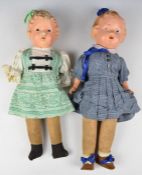 Two 1930's or 1940's composite head dolls, both with stuffed cloth body, blue eyes, red lips and