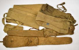 Eight canvas military and similar rifle slips and revolver holsters including Diana, some with