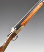 Merkel 12 bore over and under ejector shotgun with engraved locks, top plate, trigger guard, thumb