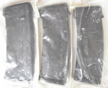 Three Magpul Emag 30 round 5.56 NATO rifle magazines, all sealed in original packaging.