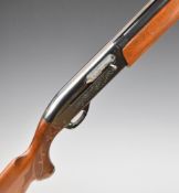 Remington Model 1100 12 bore 3-shot semi-automatic shotgun with ornately carved and chequered semi-