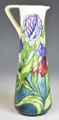 Moorcroft pottery slender trial jug decorated in the Iris pattern, 1996, height 24cm