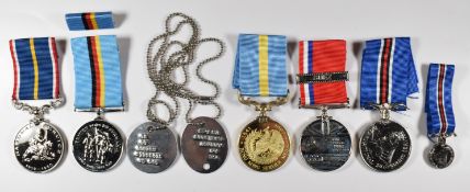 Five unofficial / commemorative medals comprising Hong Kong Service Medal, International Submarine