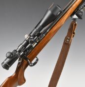 CZ .22 LR bolt-action rifle with chequered semi-pistol grip and forend, canvas and leather sling,