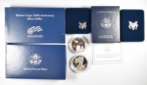 United States Mint, Marine Corps 230th Anniversary silver Dollar, together with a similar Dollar