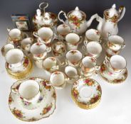 Royal Albert teaware decorated in the Old Country Roses pattern and flowers of the month cups and