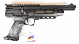 Weihrauch HW44 .177 PCP air pistol with shaped grips and adjustable sights. scope rail and 10-shot