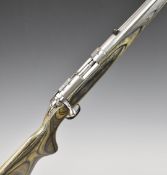 Ruger All-Weather 77/50 .50 bolt-action rifle with laminated show wood stock, semi-pistol grip,