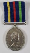 Civil Defence Long Service Medal for W T Higgins, with fitted box, paperwork and postal box