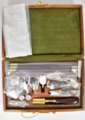 12 bore shotgun cleaning kit with rosewood and brass rods, chrome oil bottles etc, unused in
