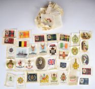 Approximately one hundred silk cigarette cards including British Army, Royal Navy, Flags of the