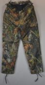 A pair of Stormkloth Real Tree Mossy Oak thermal camouflage trousers, size XL.