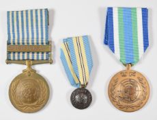 Two United Nations medals, one with clasp for Korea named to 148.427 Carignan, the other for