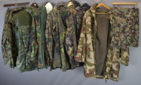 Seven military / shooting jackets / smocks of continental camouflage pattern including a