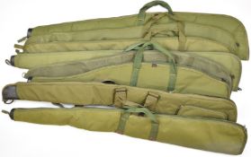 Seven various padded shotgun, rifle or air rifle slips including Akah.