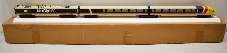 InterCity APT travel agent's display model of three carriages of the APT, on white track base,
