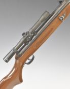 Westlake .22 air rifle with semi-pistol grip, adjustable sights and 4x20 scope, serial number