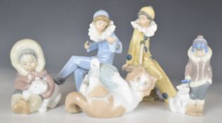 Five Lladro / Nao figures including Inuit and Pierrot, tallest 20cm