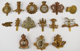 Fifteen metal cavalry cap badges for Hussars and Yeomanry including 3rd Hussars, 4th Hussars, 8th