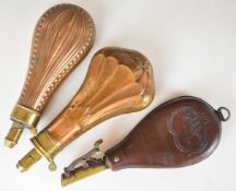 Three powder and shot flasks, all with embossed decoration, one James Dixon & Sons, largest 23cm
