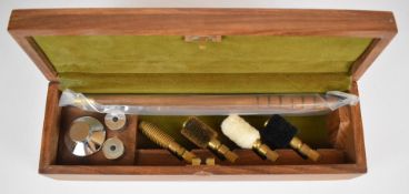 12 bore shotgun cleaning kit with chrome oil bottle and snap caps, unused in hardwood case and