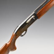 Remington Model 1100 20 bore 3-shot semi-automatic shotgun with ornately carved and chequered semi-