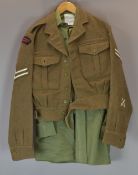Royal Marines Commando Cold War battle dress tunic (1953) with associated insignia, marked inside