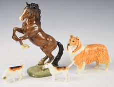 Beswick rearing shire model no 1014, collie and two hounds, tallest 27cm
