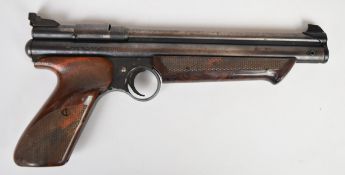 Crosman Medalist II Model 1300 .22 target air pistol with shaped and chequered faux wood grips and