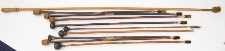 Ten wooden and brass shotgun cleaning rods including large bore, ebony and mahogany examples.
