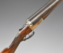 John Rigby & Co 12 bore side by side ejector shotgun with named lock, chequered grip and forend,