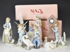 Ten Nao figures including girl with cake, tallest 24cm