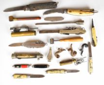 A collection of gun and shooting related items including powder measures, hammers, wad cutters,