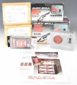 Daisy Quick Skill Target Shooting System and six sets of Daisy Point Sights, all in original boxes.