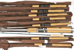 Nine unused carbon spinning rods, some branded Persicus, others unmarked