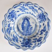 18thC Dutch Delft pedestal bowl of lobed form and King William of Orange figural decoration,