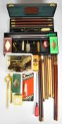 A collection of shotgun cleaning kits and accessories including Pendleton Royal, Hoppe's No 9