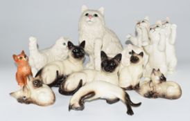 Collection of Beswick / Royal Doulton Persian and Siamese cat figures, tallest 21cm