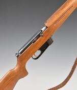 Voere .22  semi-automatic rifle with semi-pistol grip, multi-shot magazine, leather sling, sound