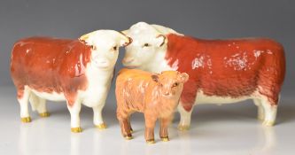 Beswick Hereford bull and cow and a Beswick Highland calf, tallest 11cm