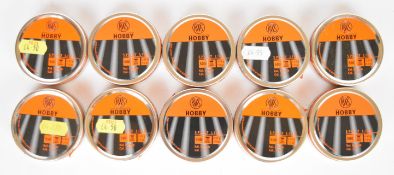 Ten sealed tins of 500 RWS Hobby .177 air rifle pellets.