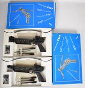 Two Mega Line fast pistol crossbows, both unused in original boxes.