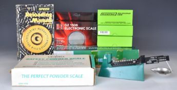A collection of cartridge re-loading tools and equipment including .308 Winchester, .243