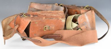 Three leather Masden light machine gun magazine pouches all with shoulder straps.