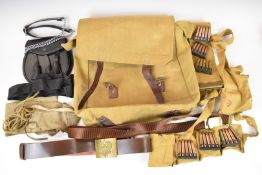 Two WW1 reproduction cloth bandoliers with blank ammunition, canvas bag, belts etc