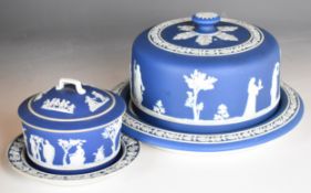 Wedgwood Jasperware cheese dome and a covered butter dish with underplate, both decorated with