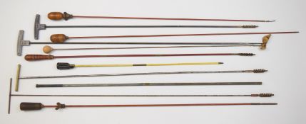 Eleven metal shotgun and rifle cleaning rods.