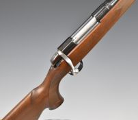 BSA .243 bolt-action rifle with chequered semi-pistol grip and forend, canvas and leather sling