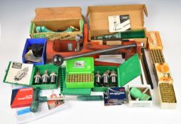 A collection of cartridge re-loading equipment including Hornady Pro 7 press and plates, primer